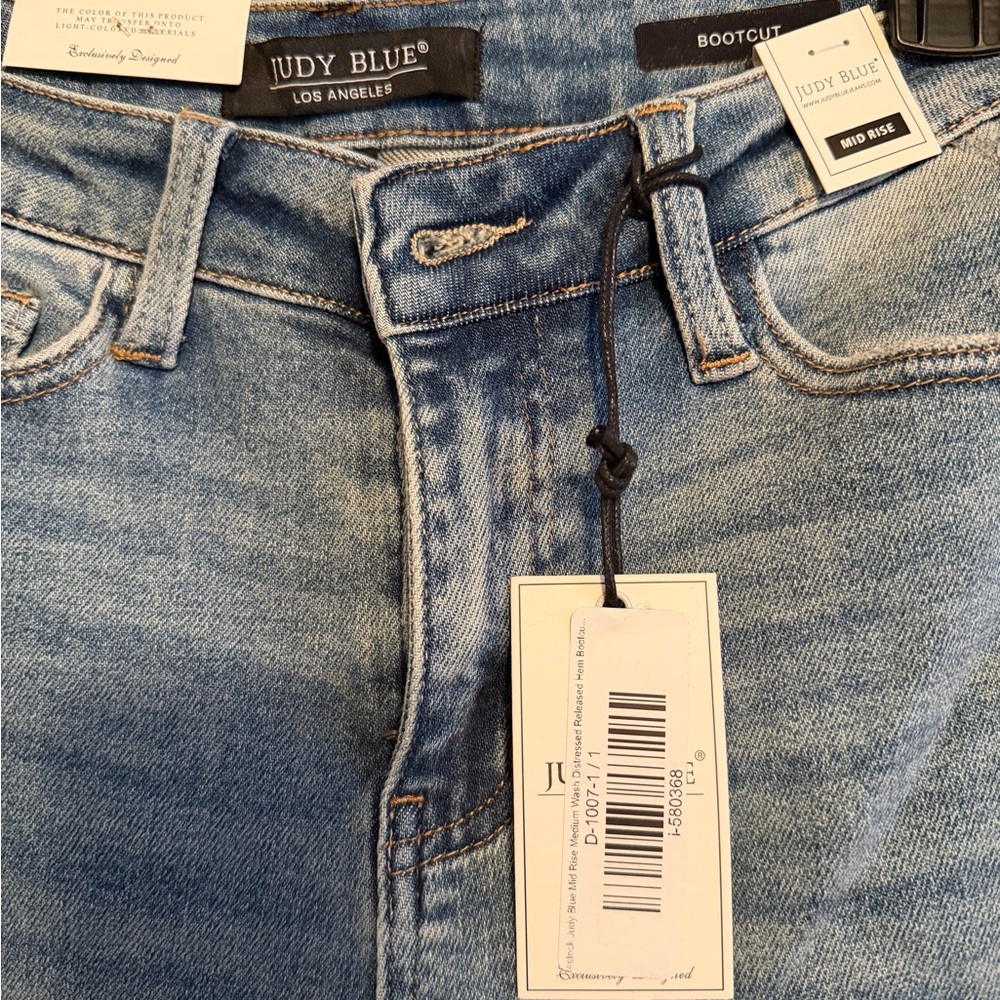 Judy Blue Mid Rise Medium
Wash Distressed Released Hem Bootcut - Picture 2 of 16